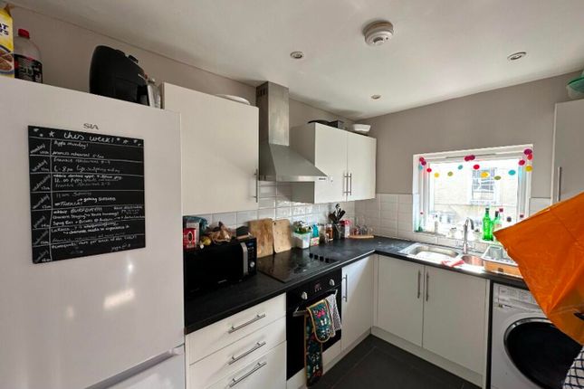 This Well-Equipped Kitchen Features Modern Applian...