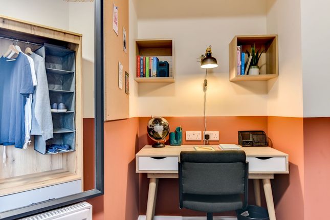 A Cozy Study Nook Featuring A Stylish Desk With A ...