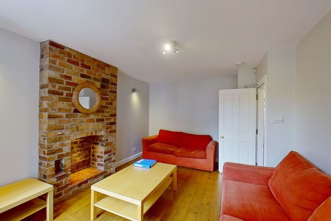 Bright, Modern Living Room With Exposed Brick Fire...