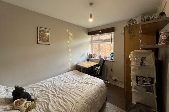 This Charming Double Bedroom Features Ample Natura...