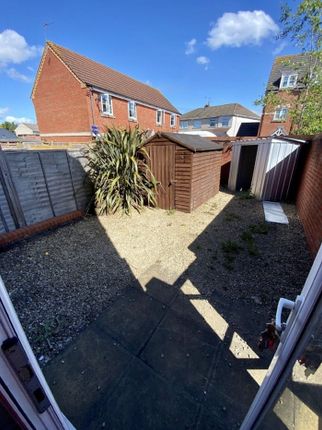 A Charming Garden Space Featuring A Well-Maintaine...