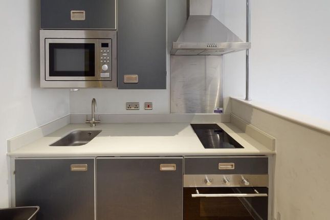 Modern Kitchen Featuring Sleek Cabinetry, Integrat...