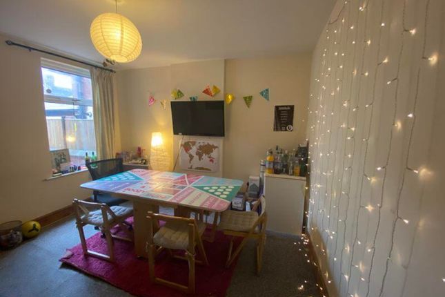 A Spacious And Inviting Large Modern Living Room W...