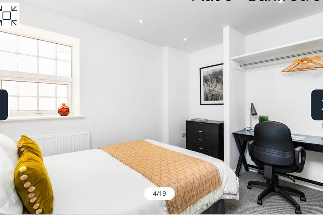 A Bright And Inviting Double Bedroom Featuring A c...