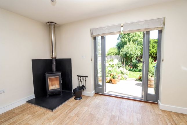 Woodburning Stove And Doors To Garden