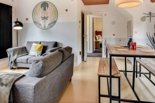 This Contemporary Living Room Features Stylish Dec...