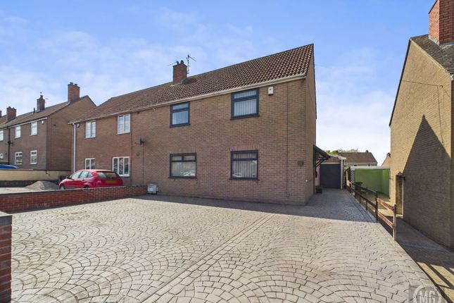 House Front With Garage And Driveway