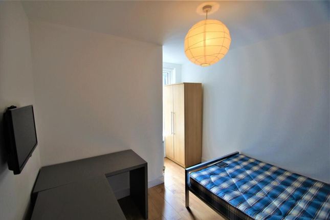 Bright And Inviting Double Bedroom Featuring A Com...