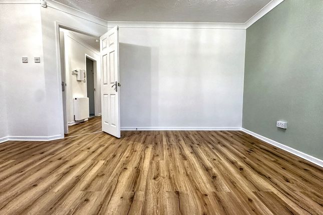 Bright, Freshly Decorated Living Room With New Woo...