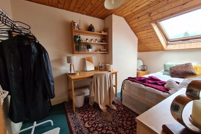 Bright And Cozy Master Bedroom Featuring A Sloped ...