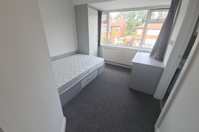 A Neat And Tidy Single Bedroom Featuring A Single ...