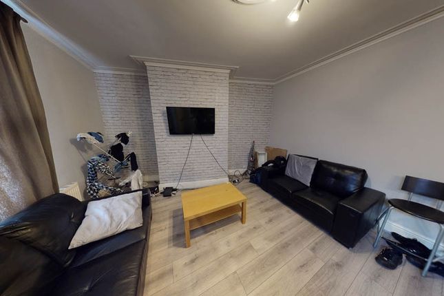 Contemporary Living Room With Matching Black Leath...