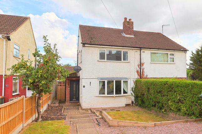 Front Of Property With Large Driveway