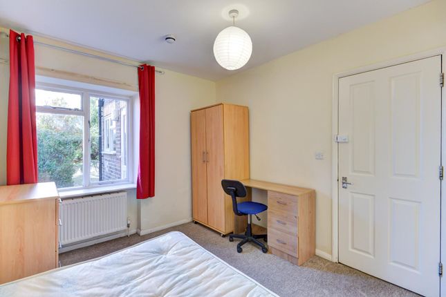 A Bright And Well-Maintained Bedroom Featuring A W...