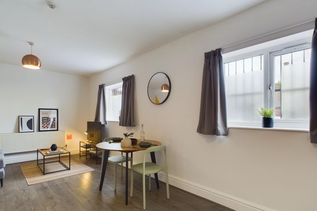 A Spacious And Stylish Modern Living Room, Perfect...