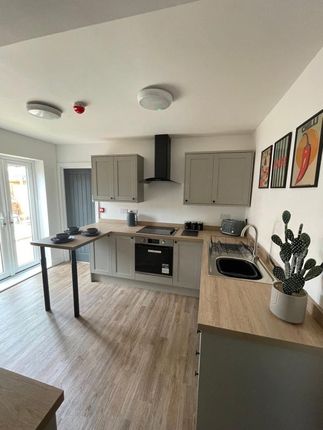 Bright, Modern Kitchen With Ample Countertop Space...