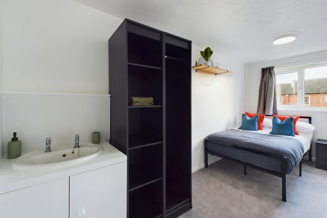 A Bright And Spacious Double Bedroom Featuring Mod...