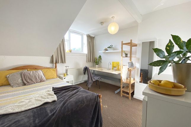 Bright, Neatly Styled Double Bedroom With A Comfor...