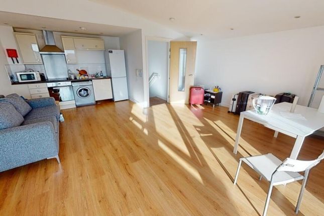 A Bright And Spacious Living Area Featuring Ample ...