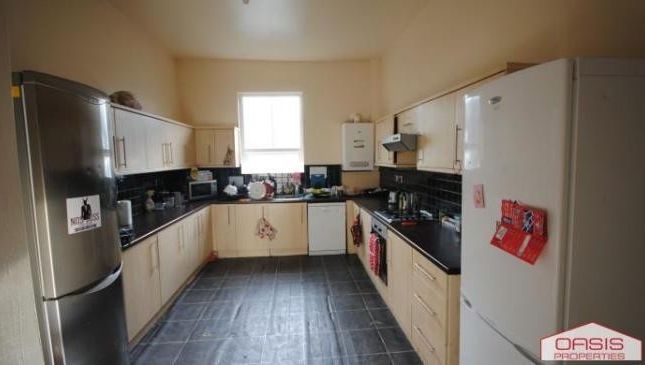Spacious And Bright Kitchen Area Featuring Modern ...
