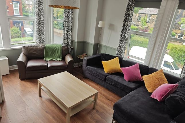 Bright And Welcoming Living Room With Comfortable ...