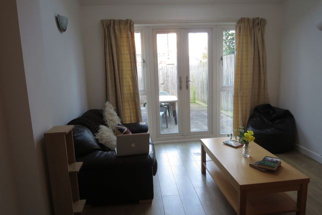 A Welcoming Living Room Filled With Natural Light,...