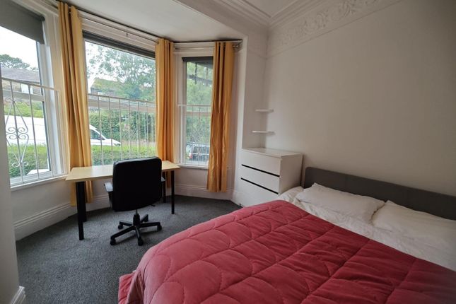 Bright And Inviting Master Bedroom Featuring A Coz...