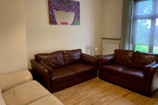 Cozy Living Room Featuring Comfortable Leather Sof...