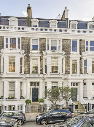Terraced house for sale in Stafford Terrace, Kensington, London W8.