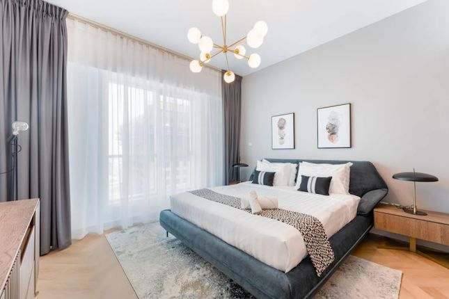 This Stylish Double Bedroom Features A Spacious La...