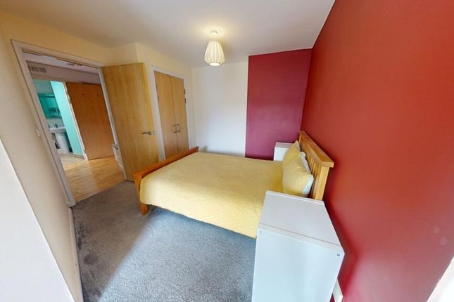 Bright And Inviting Double Bedroom Featuring A Com...