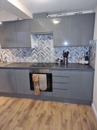 Modern Fitted Kitchen With Glossy Grey Cabinets, P...