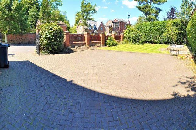 A Spacious And Well-Maintained Garden Area With Ne...