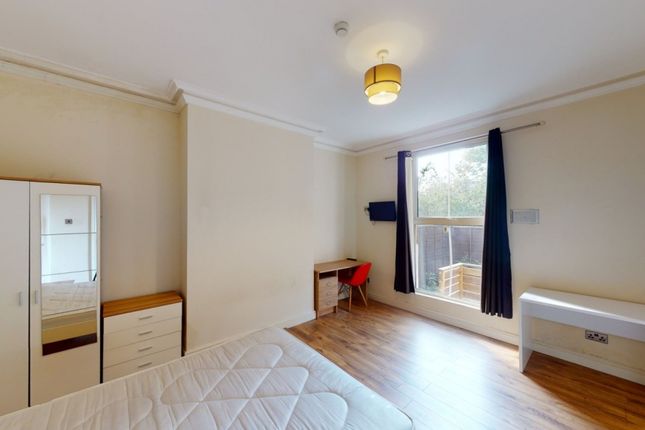 A Bright And Tidy Double Bedroom Featuring A Large...