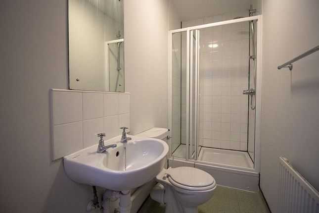 A Well-Maintained Bathroom Featuring A Modern Show...