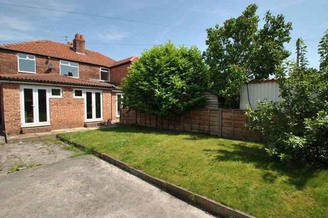 A Well-Maintained Private Garden Featuring A Spaci...