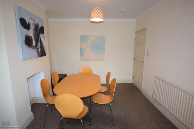 Bright And Inviting Communal Lounge Featuring A Sp...