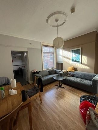 Bright, Modern Living Room With Two Grey Sofas Arr...