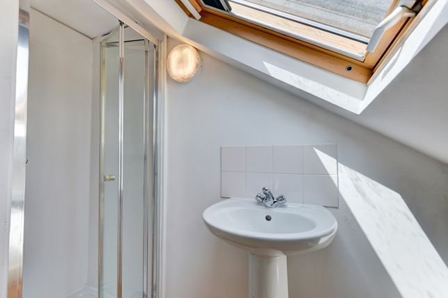 A Clean And Well-Maintained Bathroom With A Large ...