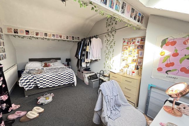 A Cozy And Bright Bedroom With A Comfortable Bed, ...