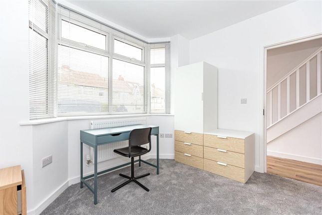 Bright And Tidy Single Bedroom Featuring A Large B...