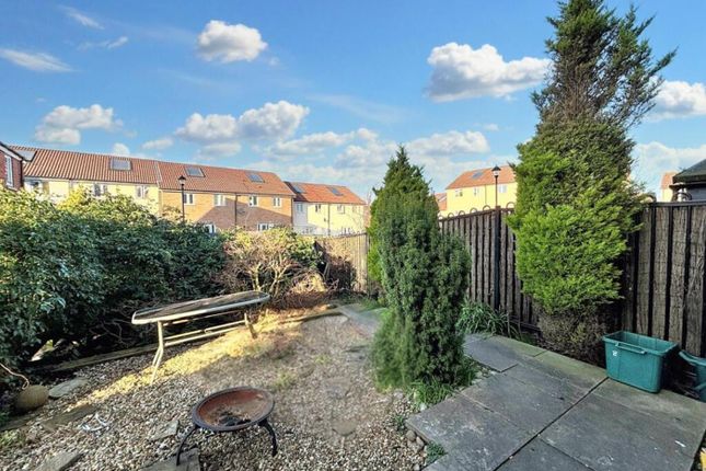 This Charming Garden Offers A Serene Outdoor Space...