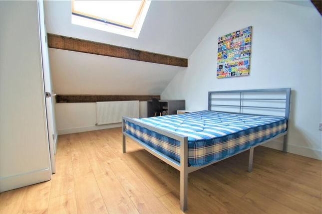 A Charming Double Bedroom Featuring A Comfortable ...