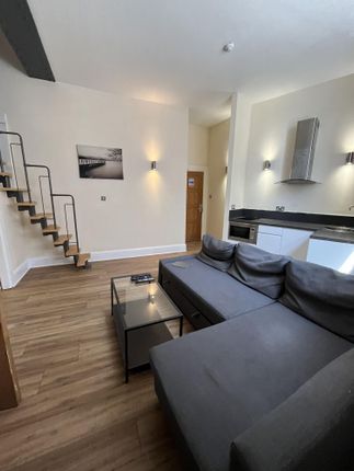 Bright And Modern Living Room Featuring A Spacious...