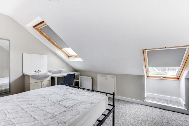 A Bright And Spacious Master Bedroom Featuring Lar...