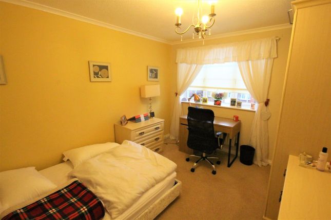 A Cozy And Inviting Double Bedroom Featuring A Com...