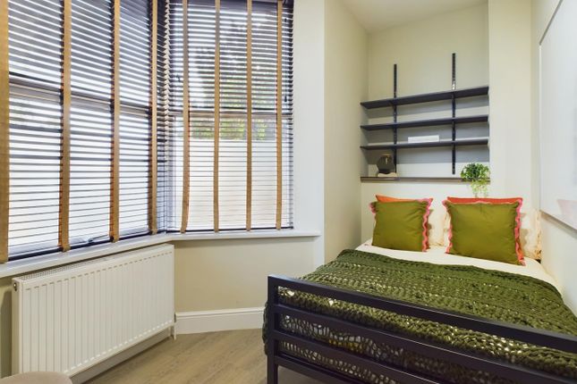 A Bright And Inviting Double Bedroom Featuring Mod...