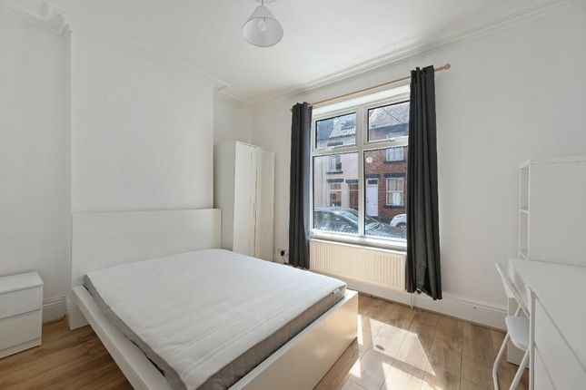 A Bright And Clean Double Bedroom Featuring A Larg...