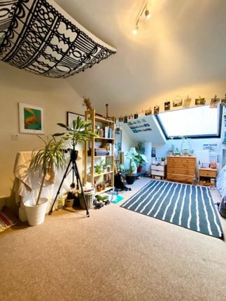 Bright And Airy Master Bedroom Featuring A Sloped ...