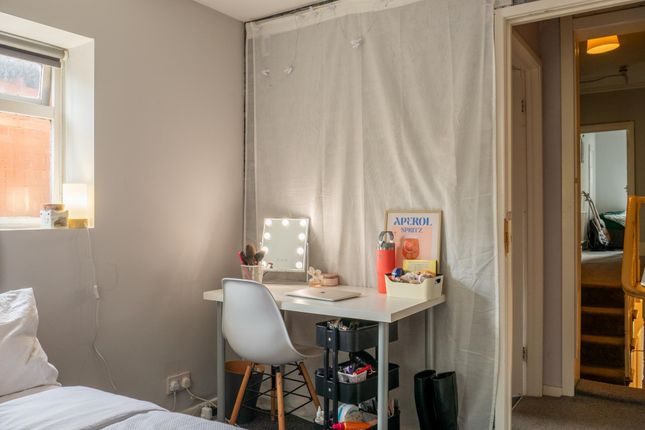 A Compact Bathroom With Basic Fixtures, Featuring ...